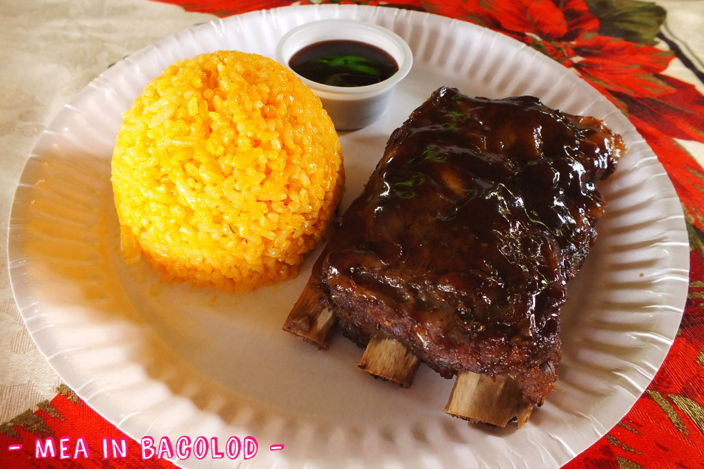 A good looking rack of baby back ribs with extra bbq sauce