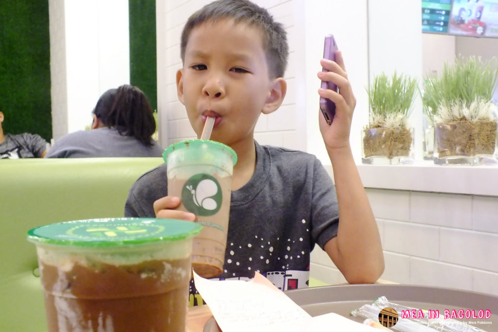 My Son Loving the Milk Tea Drinks at Serenitea